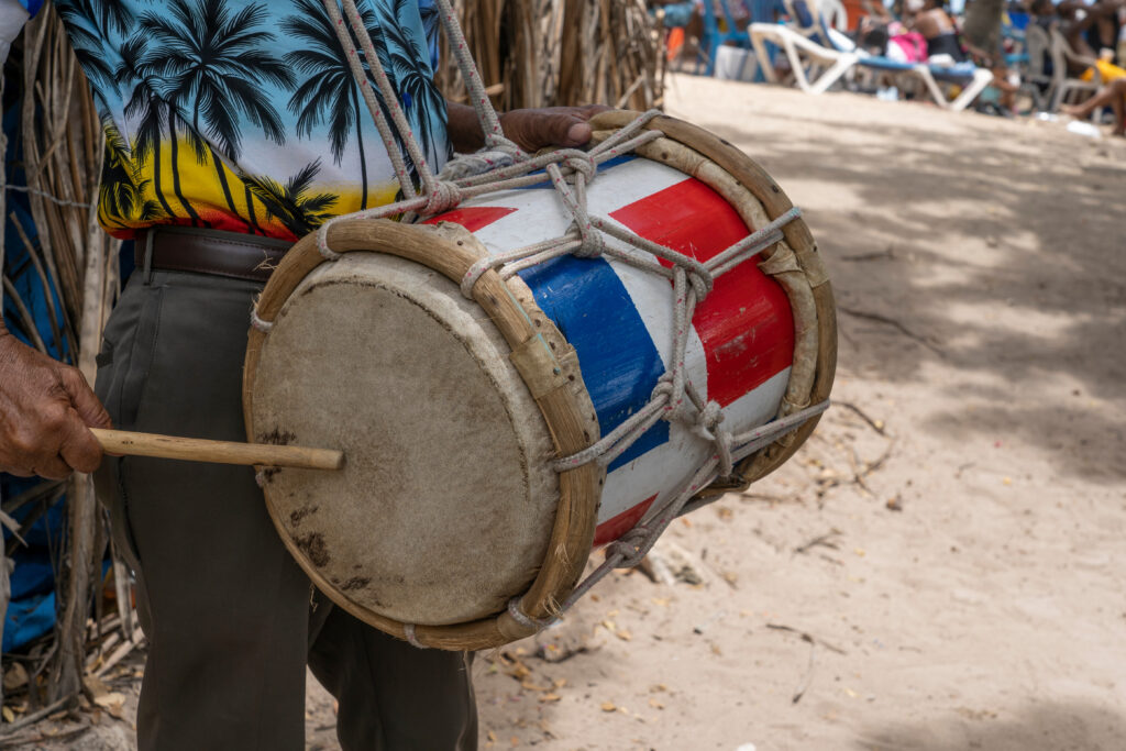 Top Events in Dominican Republic The beach musician plays the drum. Drummer