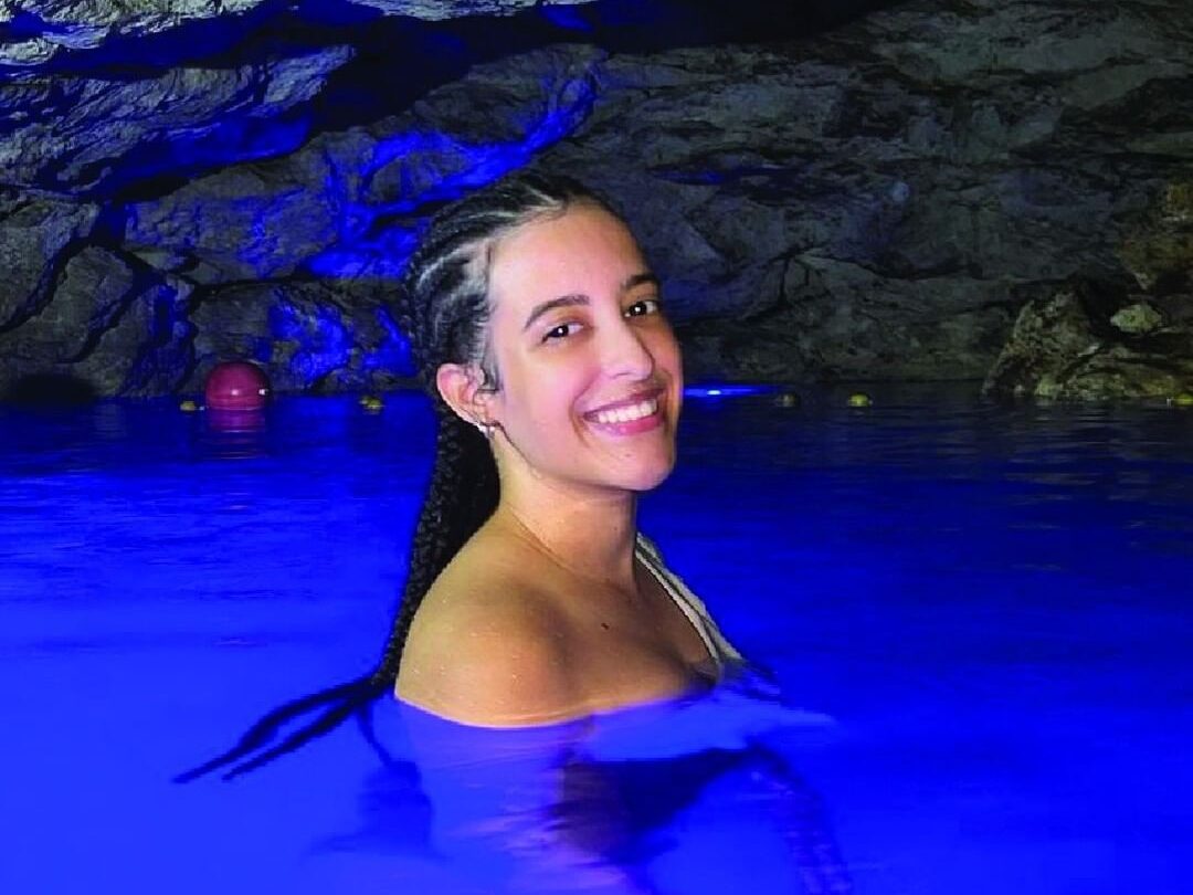 smiling woman enjoying herself in Cave swim