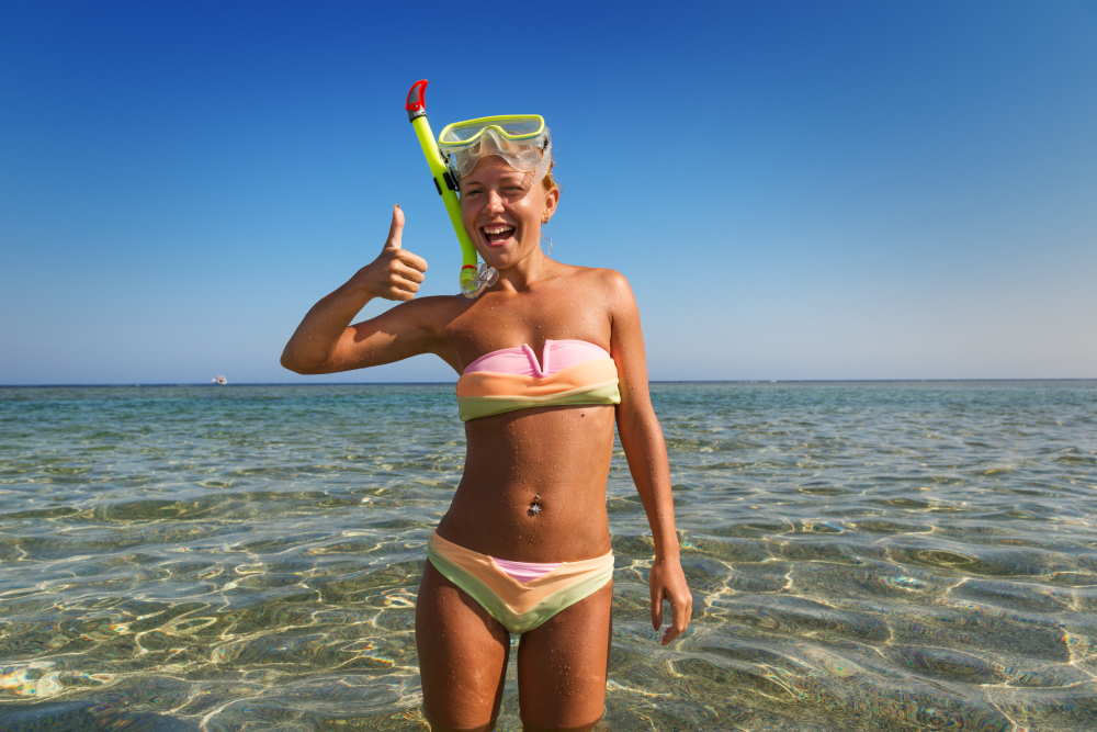 smiling woman ready for snorkeling in Boca Chica